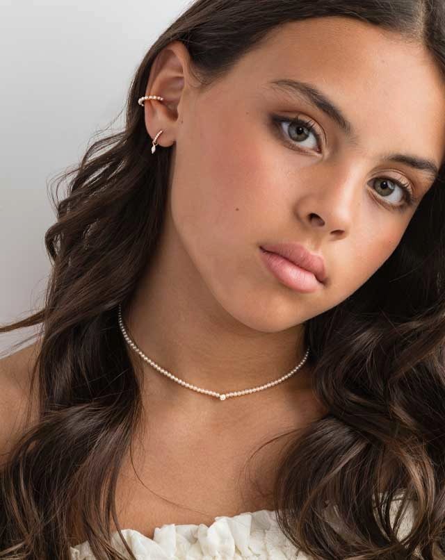 Discreet Elegance: The Art of Accumulation with our Fine Mini Hoop Earrings